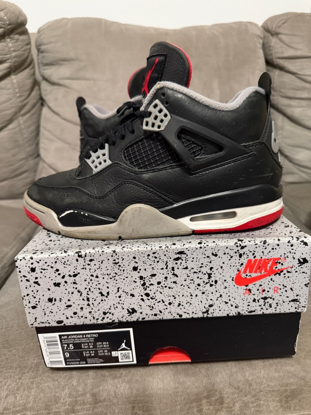 Nike Black/Red Air Jordan 4 Retro Sneakers